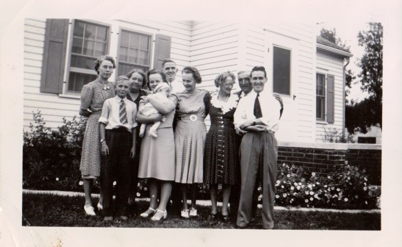 Martha Elstad Gustavson, Sheldon Sumner, Olga Elstad Sumner, Virginia Sumner Coats holding Karol Konzen, Karl Konzen, Yvonne Sumner Konzen, Ella Kuske Konzen, John Konzen, and Kermit Konzen  in 1940.